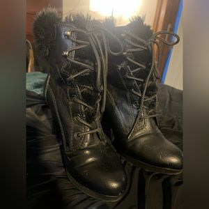 A.N.A black leather boots with fur lining and outside of tongue. Size 9 1/2 M